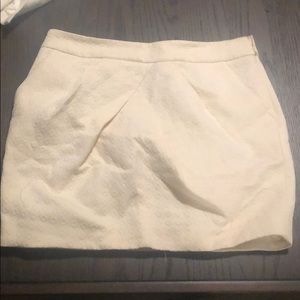 Beige patterned mini skirt